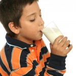 Teenager enjoying a fresh glass of milk
