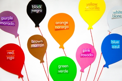 The English and Spanish words for each color labels a balloon for each color